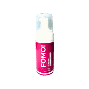 Coconut scented foam tanning accelerator bottle.