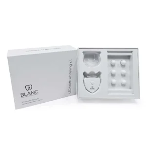 LED teeth whitening kit with mouthpiece and capsules.