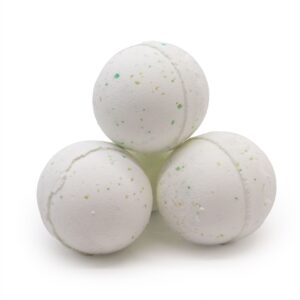 Three white speckled bath bombs stacked together
