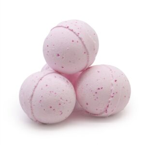 Stack of pink speckled bath bombs