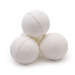 Four white spherical bath bombs stacked together