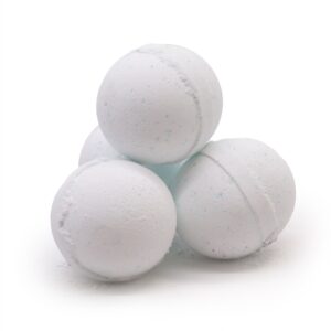 Stack of white bath bombs on white background